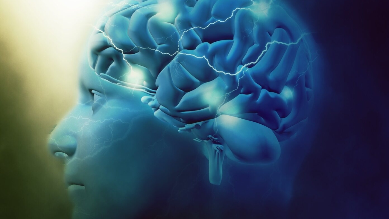 3D render of a male head with brain and lightening effect